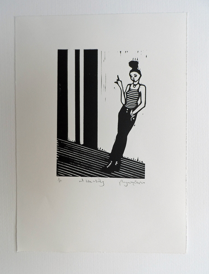 A black and white linocut artwork of a female figure with a bun standing on one foot, with a pointing finger, titled and signed by Polly Marix-Evans.