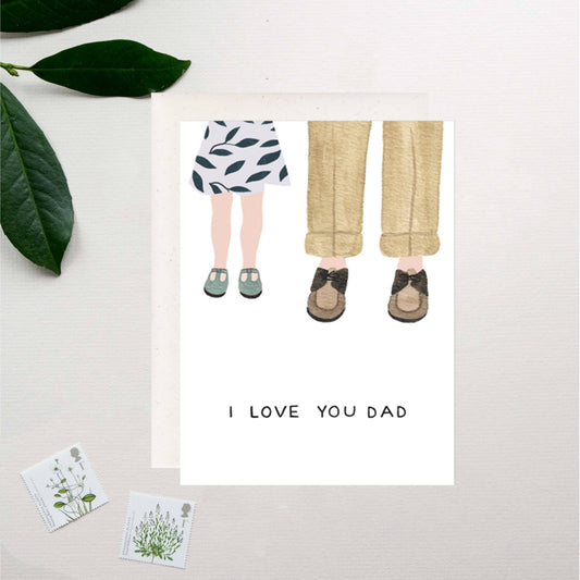 Illustration of a child and adult legs with 'I LOVE YOU DAD' text on a white background.