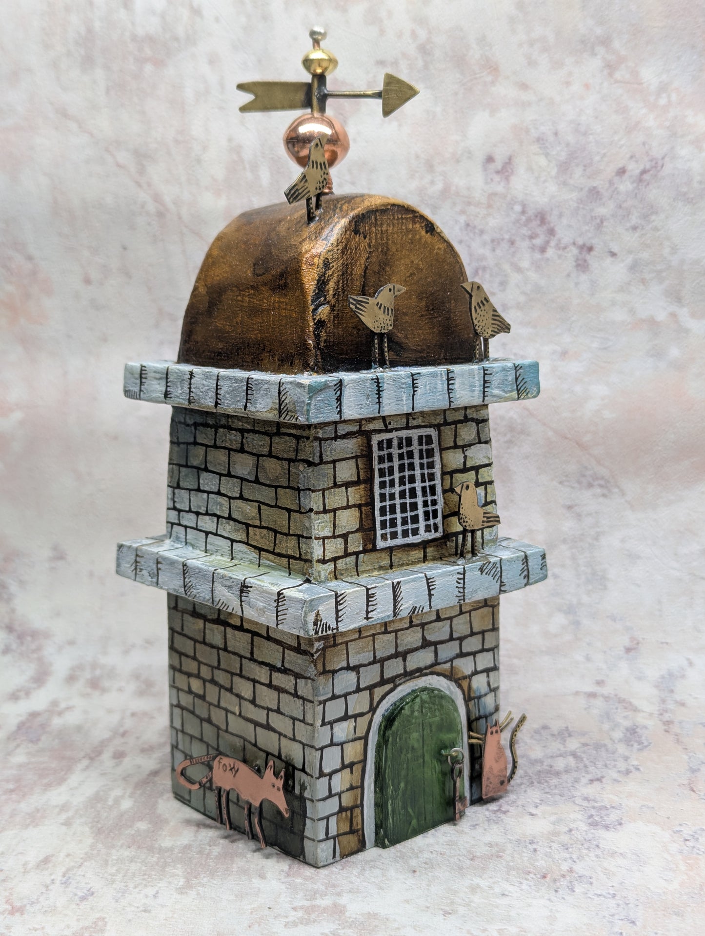 large Frances Noon house with foxy on the side and a cat at the door