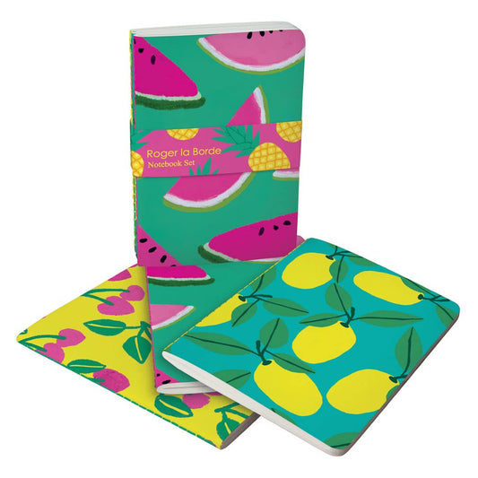 Set of notebooks with fruit patterns on a white background