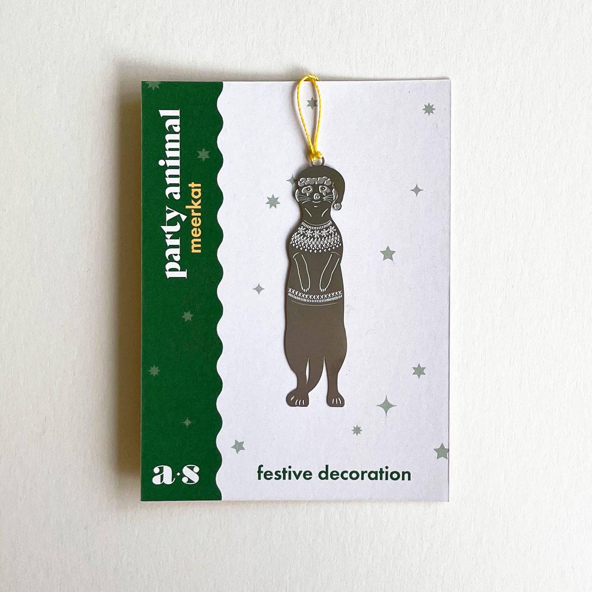 A stainless steel meerkat Christmas jumper decoration with a festive color cord by Another Studio