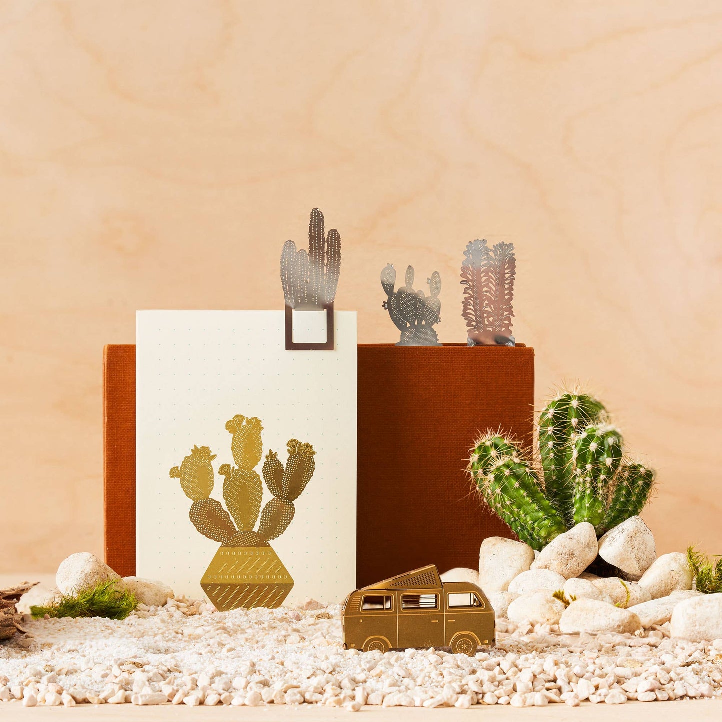 A set of four metal cactus-shaped bookmarks in silver colour that clip on to pages by Another Studio for Heart Gallery