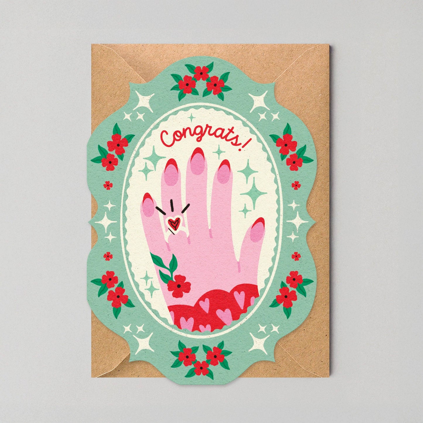 Greeting card with hand illustration and 'Congrats!' text on a gray background
