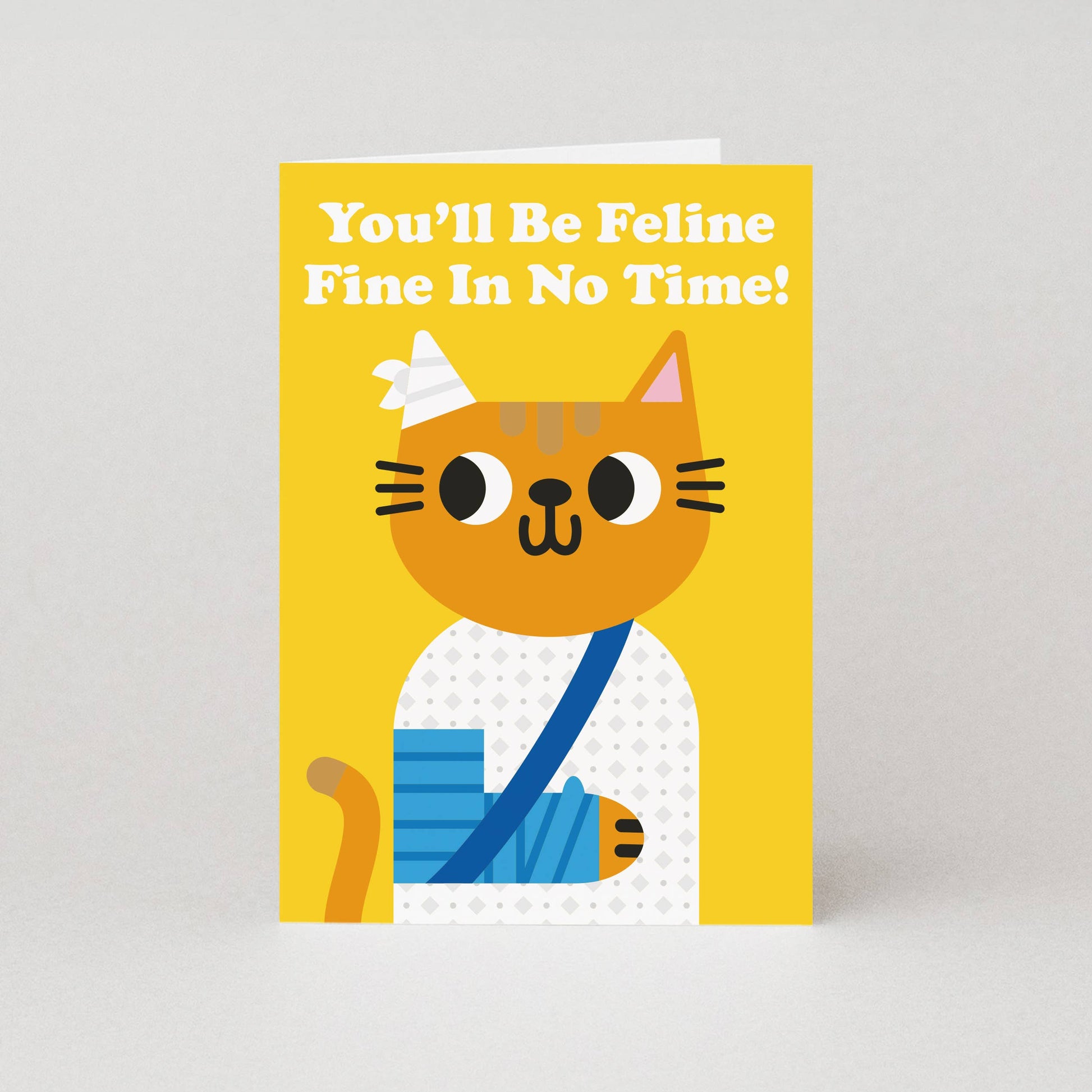 Greeting card with a cartoon cat illustration and text on a yellow background