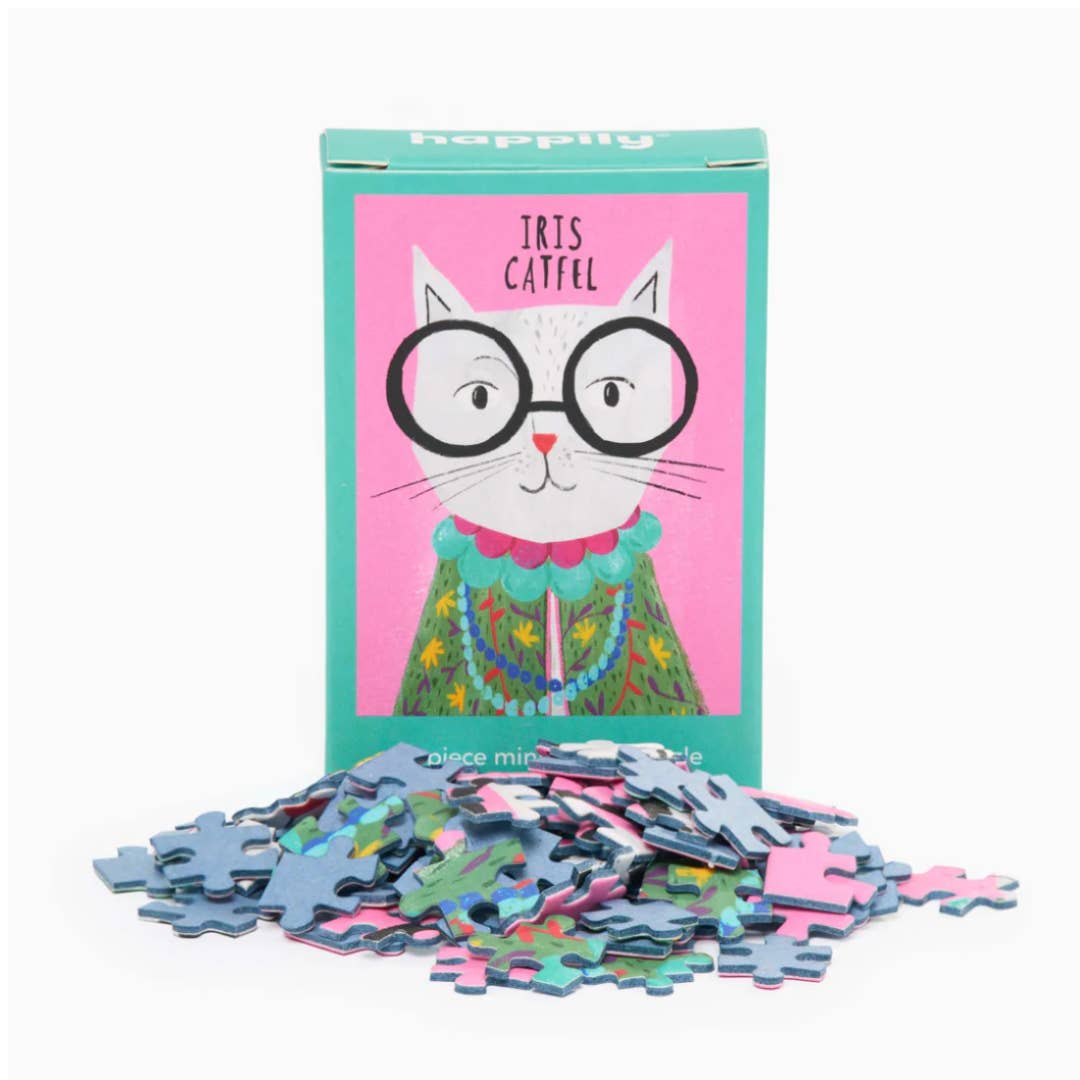 Jigsaw Puzzle with a cat illustration on the packaging against a pink background Iris Catfel 99 pieces