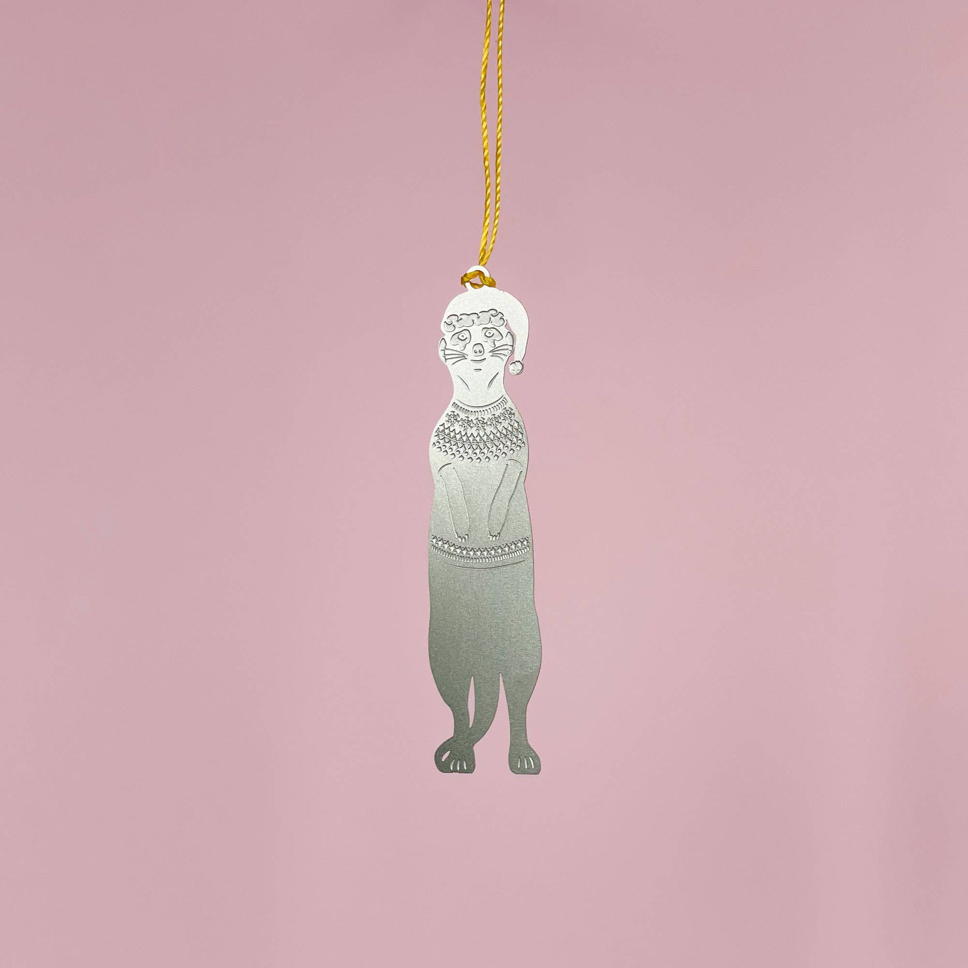 A stainless steel meerkat Christmas jumper decoration with a festive color cord by another Studio for Heart Gallery