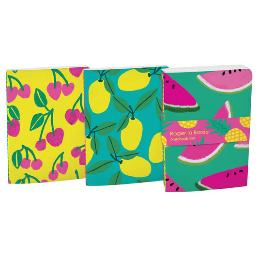 Three colorful notebooks with fruit patterns on a white background