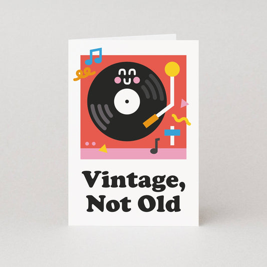 Greeting card with vinyl record illustration and 'Vintage, Not Old' text on a white background