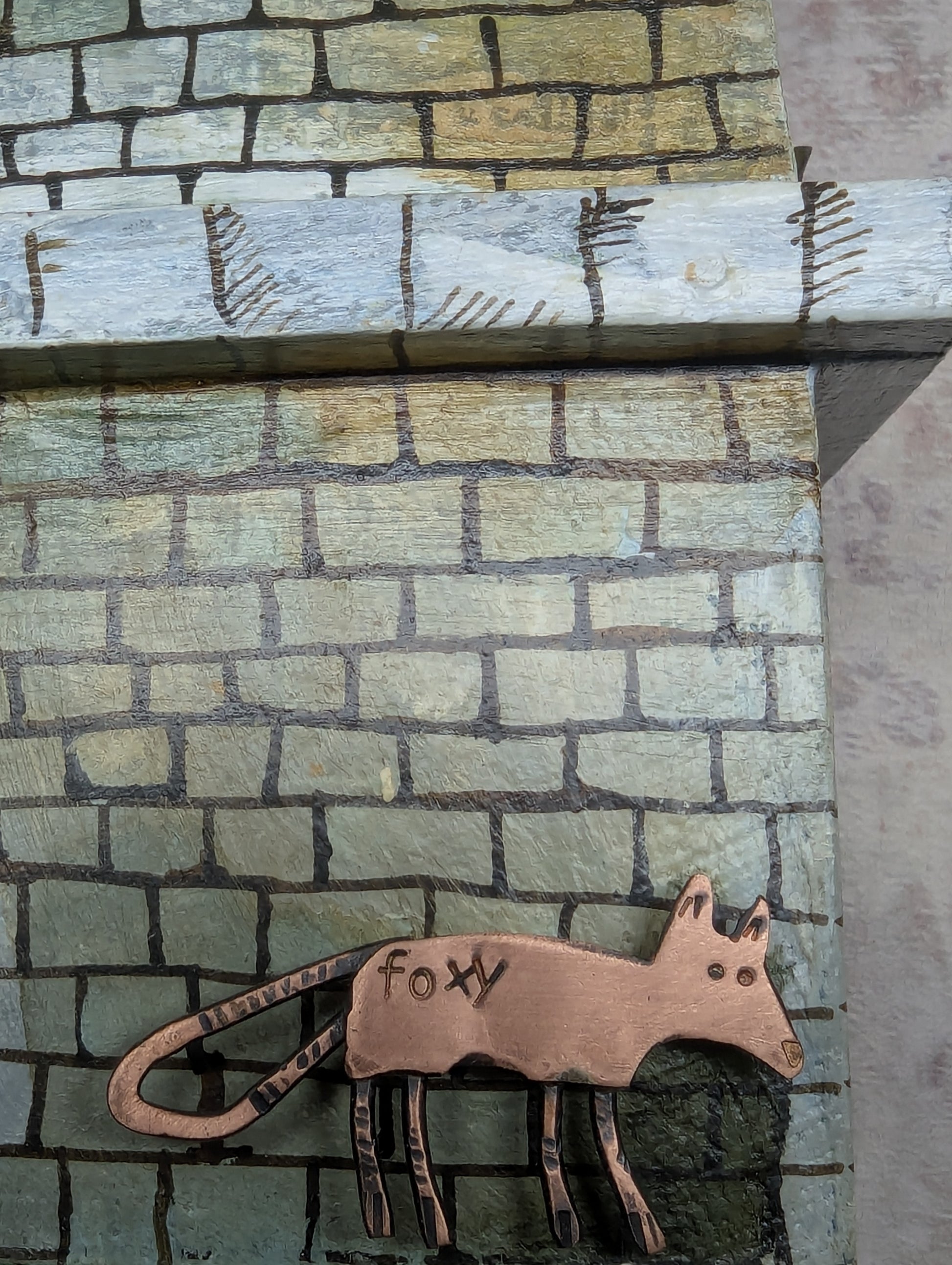 close up detail of foxy on side of house by Frances Noon