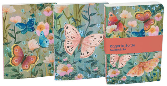Set of three notebooks with butterfly and floral design packaging.